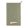 A green cooling towel with a logo, featuring a textured surface and a stitched edge.
