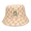 A pink and yellow patterned bucket hat featuring an embroidered patch. The design includes heart shapes and has a logo.