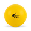 A yellow exercise ball with a logo in black, featuring a smooth, round surface.
