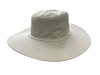 A white canvas hat with a wide brim and a structured top, featuring a logo on the side.