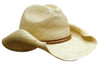 A ladies cowboy straw hat in a light beige colour with a brown band around the base. It has a wide brim design.