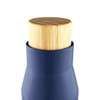 A drink bottle in navy blue with a natural bamboo lid. It features a sleek design and includes a logo.