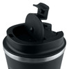 A reusable black coffee mug featuring a silver band and a flip-top lid. It includes a logo or branding element.