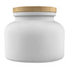 A white candle jar with a textured gold lid, featuring a simple and elegant design.