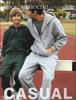 A grey unisex zip-through fleece hoodie and matching tracksuit pants, alongside a green version, both featuring a logo.
