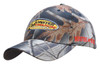 A camouflage cap featuring a leaf print design in shades of brown and grey, with a logo on the front.
