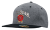 A grey marle flannel cap with a black peak and a logo on the front.