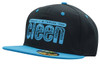 A black cap with a blue peak featuring a logo. The design includes a bold blue graphic on the front.