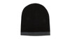 A two-tone beanie in black with a grey roll-down cuff. Features a simple design and has a logo.