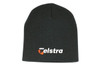 A black rolled down acrylic beanie featuring a logo.