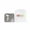 A grey jelly cube sensory toy next to a transparent container featuring a logo.