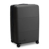 A large black suitcase with a smooth exterior and wheels, featuring a brand logo on the side.