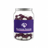 A clear jar filled with purple and white jelly beans, featuring a logo on the front.