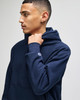 A navy blue Champion Reverse Weave® adult pullover hooded sweatshirt with a logo on the sleeve.