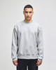 A grey Champion Reverse Weave® adult crew sweatshirt with long sleeves and a relaxed fit, featuring a logo.