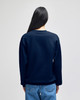 A navy blue adult crewneck sweatshirt with a relaxed fit, featuring a simple design and long sleeves.