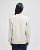A light grey crewneck sweatshirt with a relaxed fit, featuring long sleeves and a simple design.