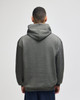 A grey pullover hooded sweatshirt seen from the back, featuring a simple design and a hood.
