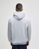 A grey pullover hooded sweatshirt viewed from the back, featuring a spacious hood and relaxed fit.