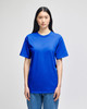 A blue adult short-sleeve t-shirt on a model, featuring a relaxed fit and a simple design.