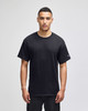 A black short-sleeve t-shirt with a logo on the sleeve, displayed on a model against a plain background.