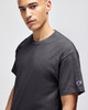A dark grey short-sleeve t-shirt featuring a logo on the sleeve, designed for adults.