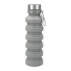 A drink bottle in grey with a collapsible design and a silver cap, featuring a carabiner attachment.