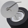 A sleek, black drink bottle with a stainless steel lid and a curved straw attachment.