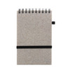 A6 notebook made from recycled coffee grounds, featuring a brown and beige textured cover and a black elastic band.