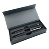 A black pen set in a grey gift box with an insert to hold the pens securely. The box has a lid.