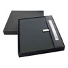 A black notebook and pen gift set presented in a sleek black box, featuring a stylish closure and an accompanying pen.