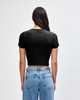 A black cropped fitted T-shirt with short sleeves, viewed from the back, paired with high-waisted denim jeans.