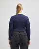 A navy blue long-sleeve fitted crop t-shirt with a crew neckline, viewed from the back.