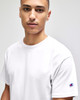 A white short sleeve t-shirt for adults featuring a logo on the sleeve.
