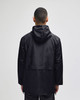 A black full-zip anorak jacket with a hood, featuring a simple design and a logo. Back view of the jacket.