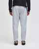 A pair of grey fleece joggers with an elastic waistband, featuring a casual fit and a logo.