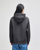 A cropped hoodie in dark grey with a hood, featuring a logo and loose fit.