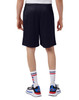 A person wearing navy Champion adult mesh shorts with pockets, viewed from the back, paired with stylish shoes and socks.