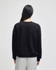 A black women's crewneck sweatshirt with a loose fit, featuring long sleeves and a simple design.