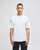 A white Champion Adult Heritage Jersey T-Shirt displayed on a model against a plain background.