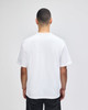 A white Champion adult heritage jersey t-shirt viewed from the back, featuring a relaxed fit.