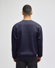 A navy blue adult sweatshirt featuring long sleeves and a relaxed fit, with a back view showing minimal detail.