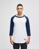 A white and navy blue raglan baseball T-shirt with three-quarter sleeves and a logo on the sleeve.