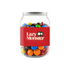 A clear jar filled with colourful M&M's, featuring various vibrant shades and a playful branding label.
