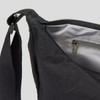 A black bag with a zippered opening and an interior pocket, featuring a sturdy strap. It has a simple, sleek design.