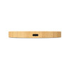A wireless charger in a natural wood finish, featuring a USB-C port at the back.