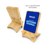 A bamboo phone stand, featuring a blue illuminated panel, with a logo area and a simple design.