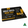 A mouse mat featuring a coffee theme, predominantly in black and gold, with a logo and an image of a coffee cup.