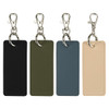 Four rectangular keychains in black, olive green, blue, and beige with metal clips and branding.
