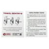 A portable luggage TSA lock with a shackle and dials, accompanied by instructional cards. The lock is silver.